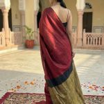 Tarini Maroon and Black Cotton Saree with Gold Tissue Border